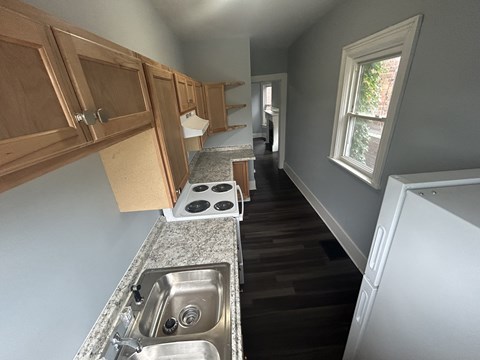 a view of the kitchen from the living room